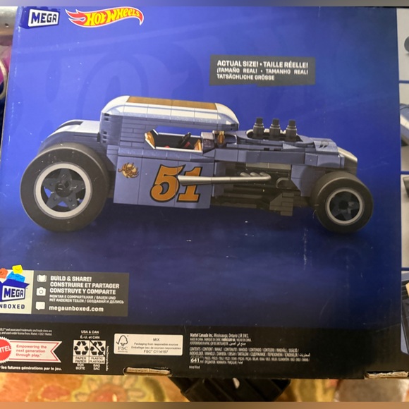 Hot Wheels Blue and Yellow Racing Car Toy - Picture 2 of 3